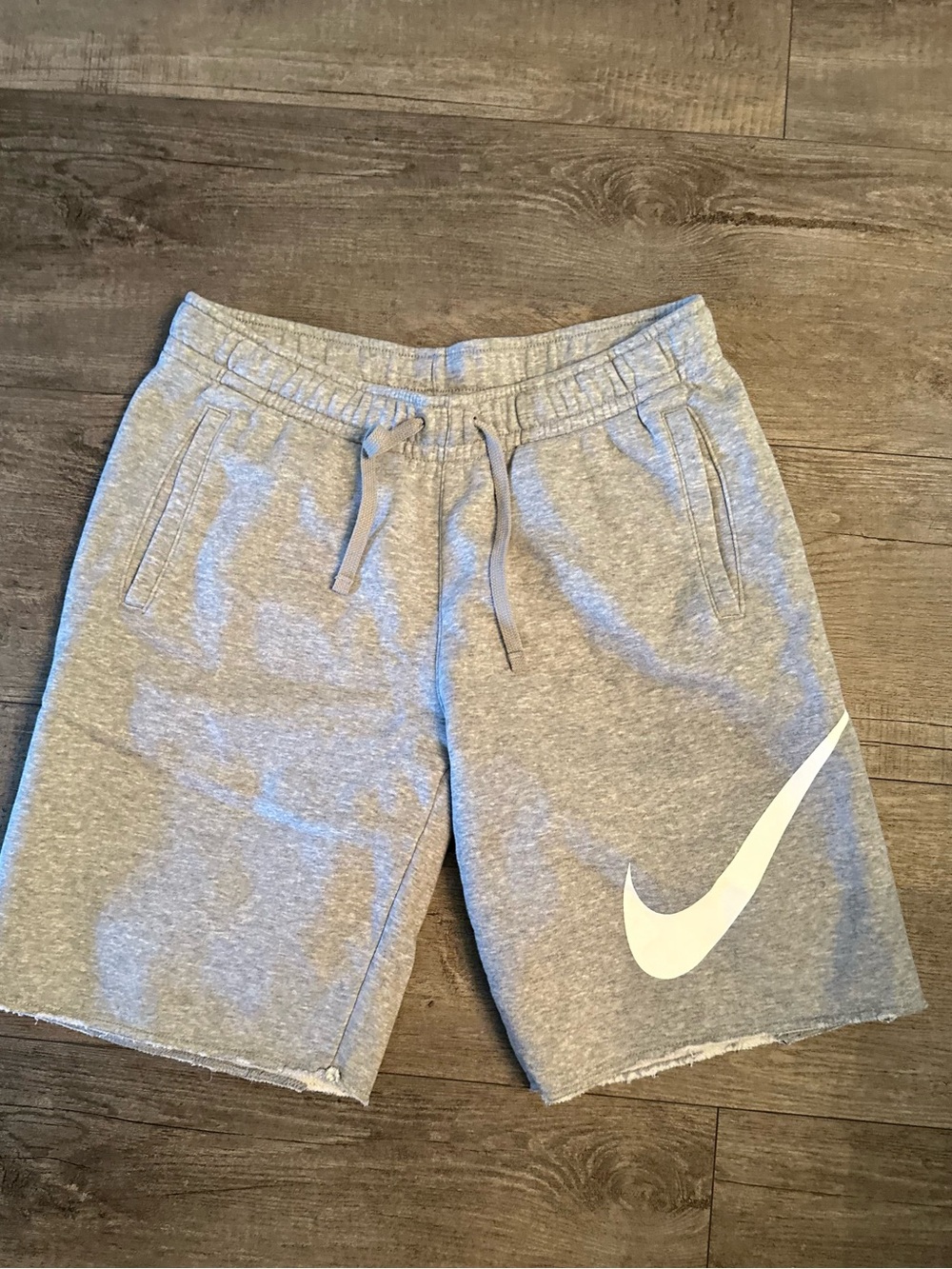 Nike Men's Light Gray Athletic Shorts with White Swoosh